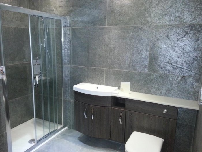 Панели для ванной под камень