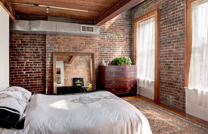 Спальня в стиле лофт с кирпичной стеной