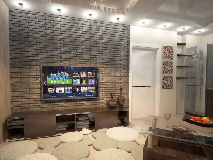 Декоративный камень в гостиной с телевизором