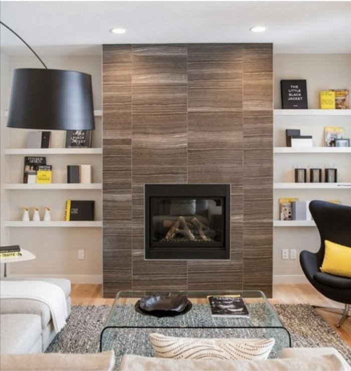 Интерьер гостиной в скандинавском стиле с камином