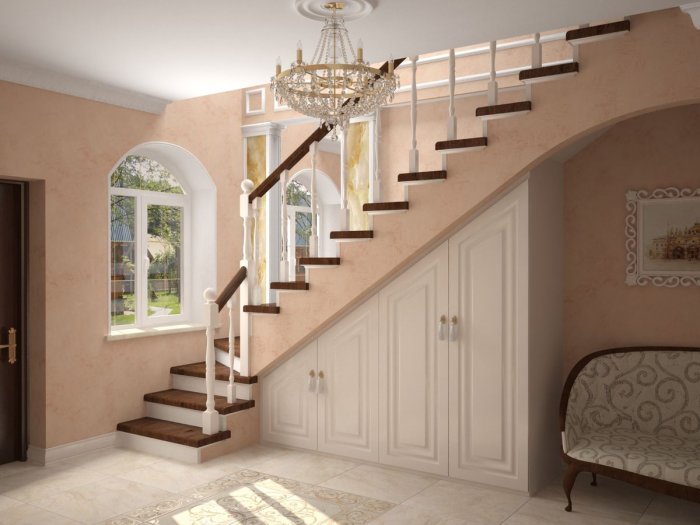 Лестница на второй этаж в гостиной в частном доме