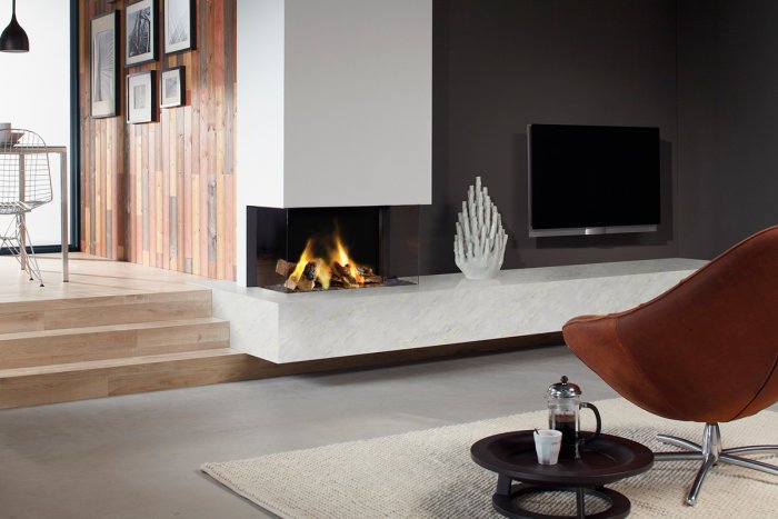 Угловой биокамин в интерьере гостиной