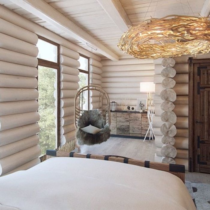 Потолок в доме из оцилиндрованного бревна