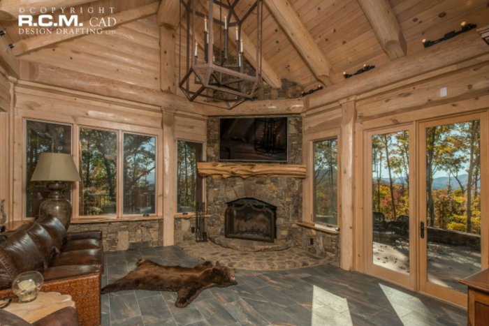 Дом из брёвен с панорамными окнами в охотничьем стиле