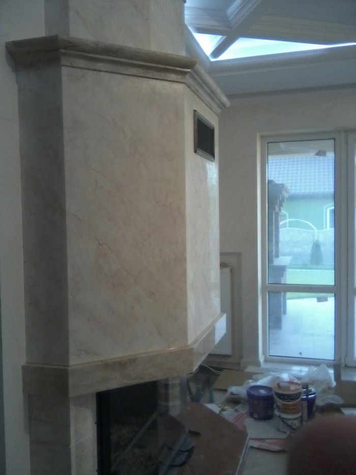Декорировать камин штукатуркой