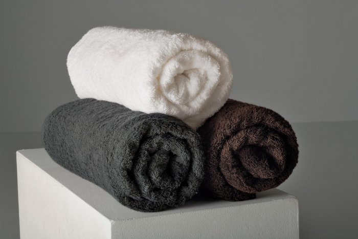 Свернутые в трубочку полотенца