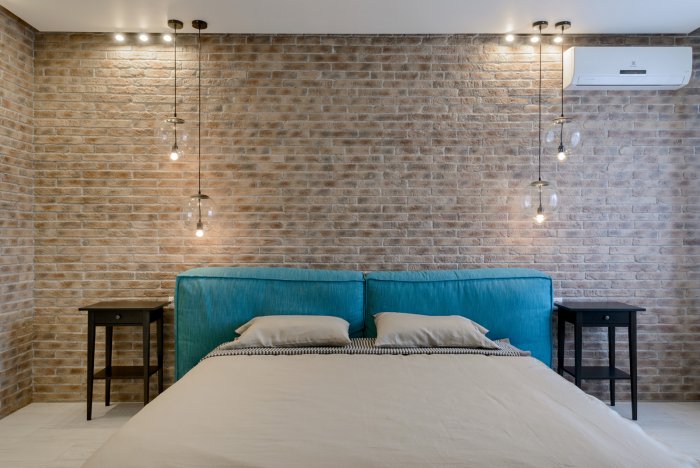 Неоштукатуренный кирпич в интерьере