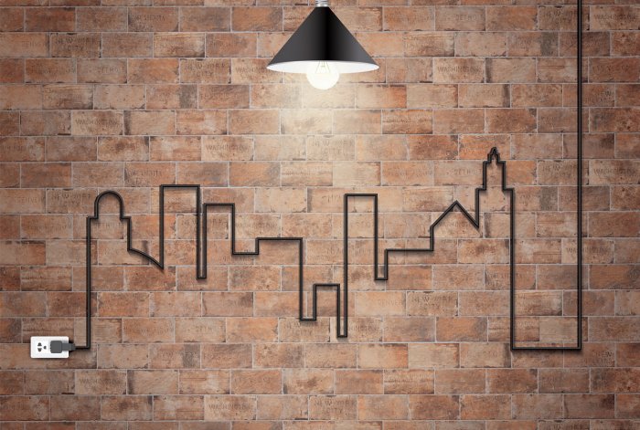 Светильники на кирпичной стене в интерьере