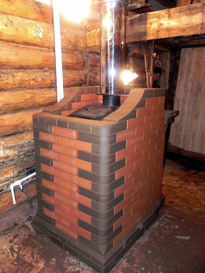 Печь Gefest обложенная кирпичом