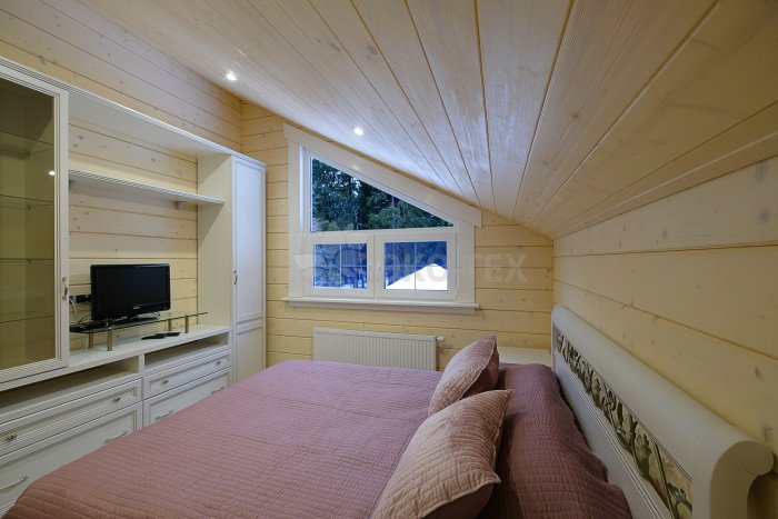 Обшивка мансарды имитацией бруса