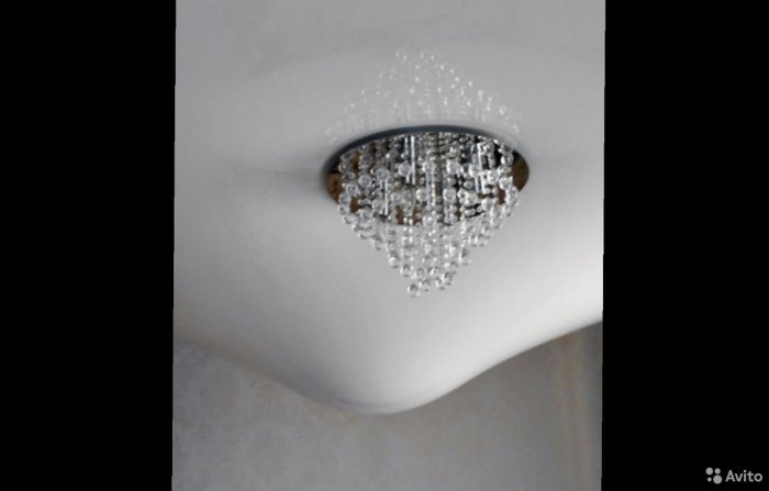 Слив воды с натяжного потолка