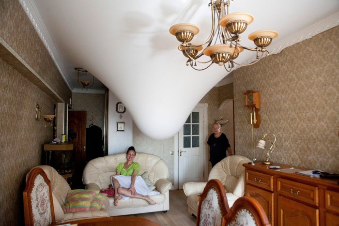 Натяжной потолок протечка