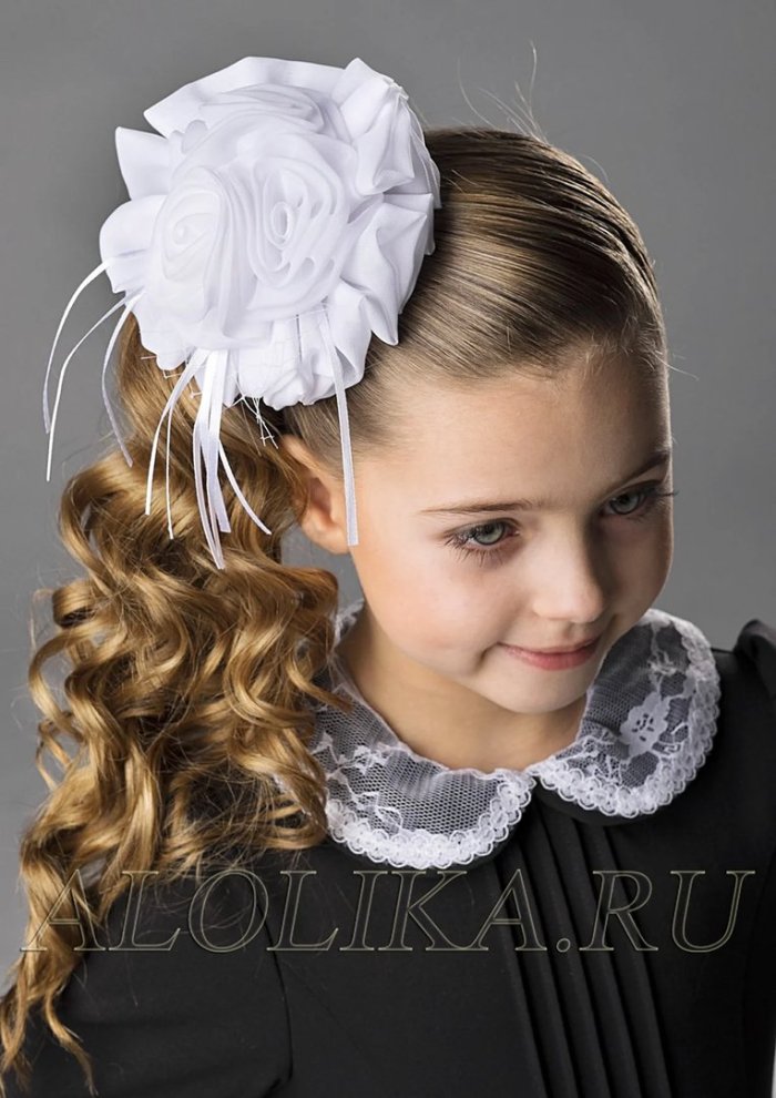 Прическа с бантом для девочки